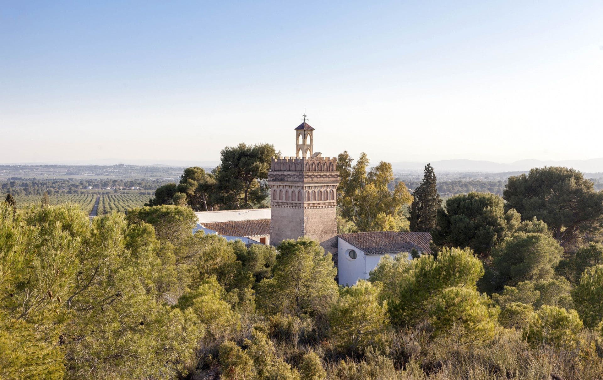 Historic property with a unique tower located less than 30km from the city of Valencia offering crops and an olive press.